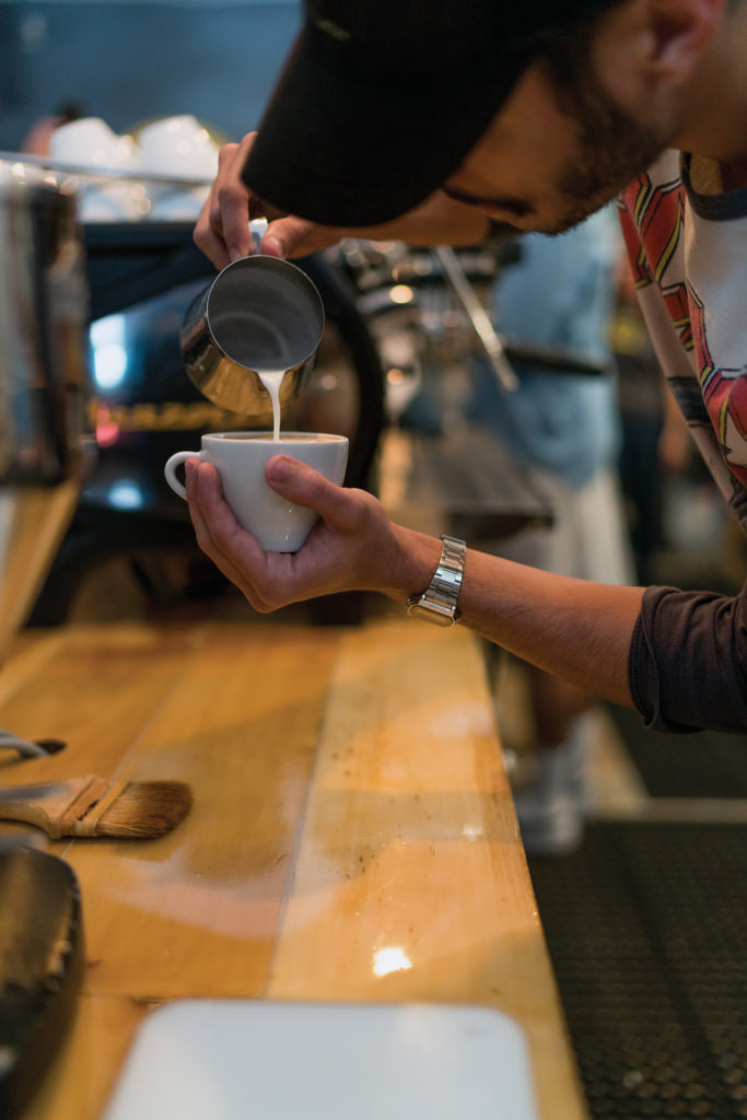 A barista competes in a 2016 latte art contest in Miami.