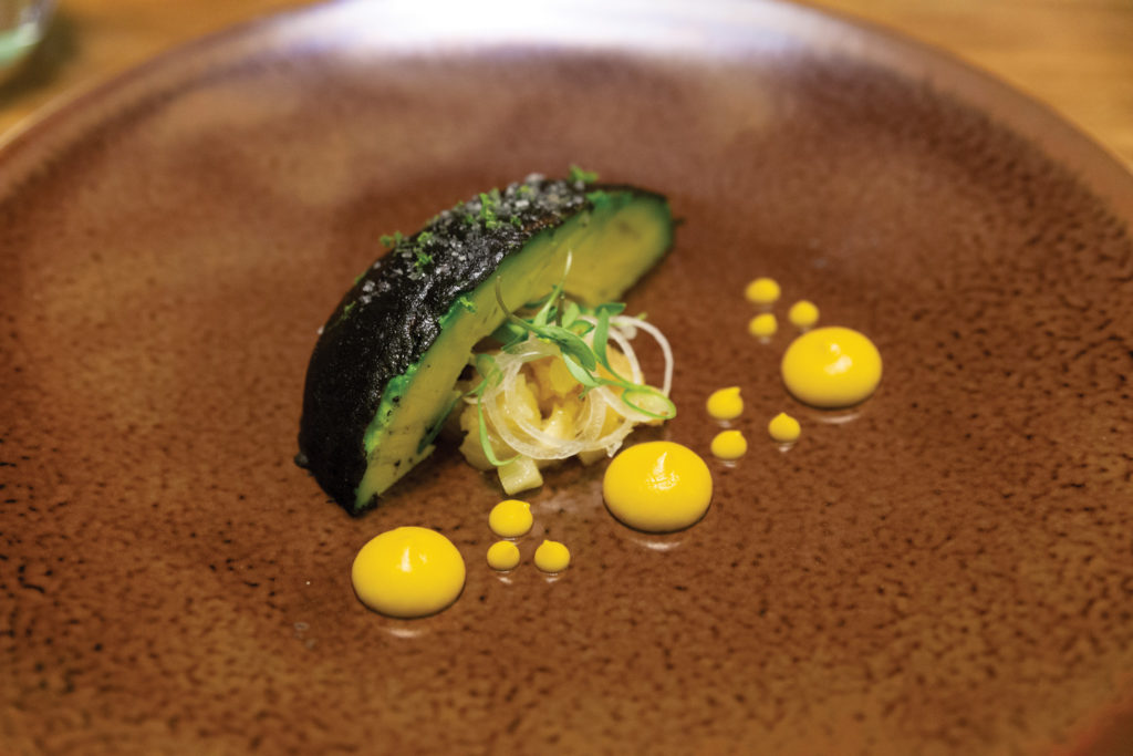 Dishes on the tasting menu at Quintonil (an avocado with a blackened chile crust)