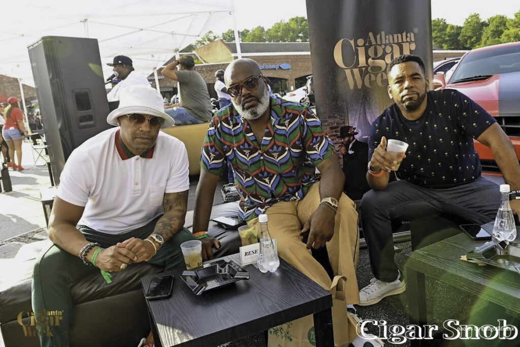 Left and Middle VIP Attendee Kelly Fladger Music Exec Kevin Coach K Lee at Cigars Cars Block Party