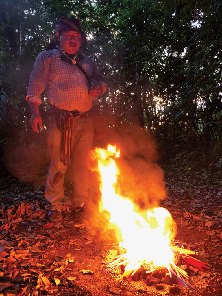 The shaman reads the flames during this Mayan ritual.